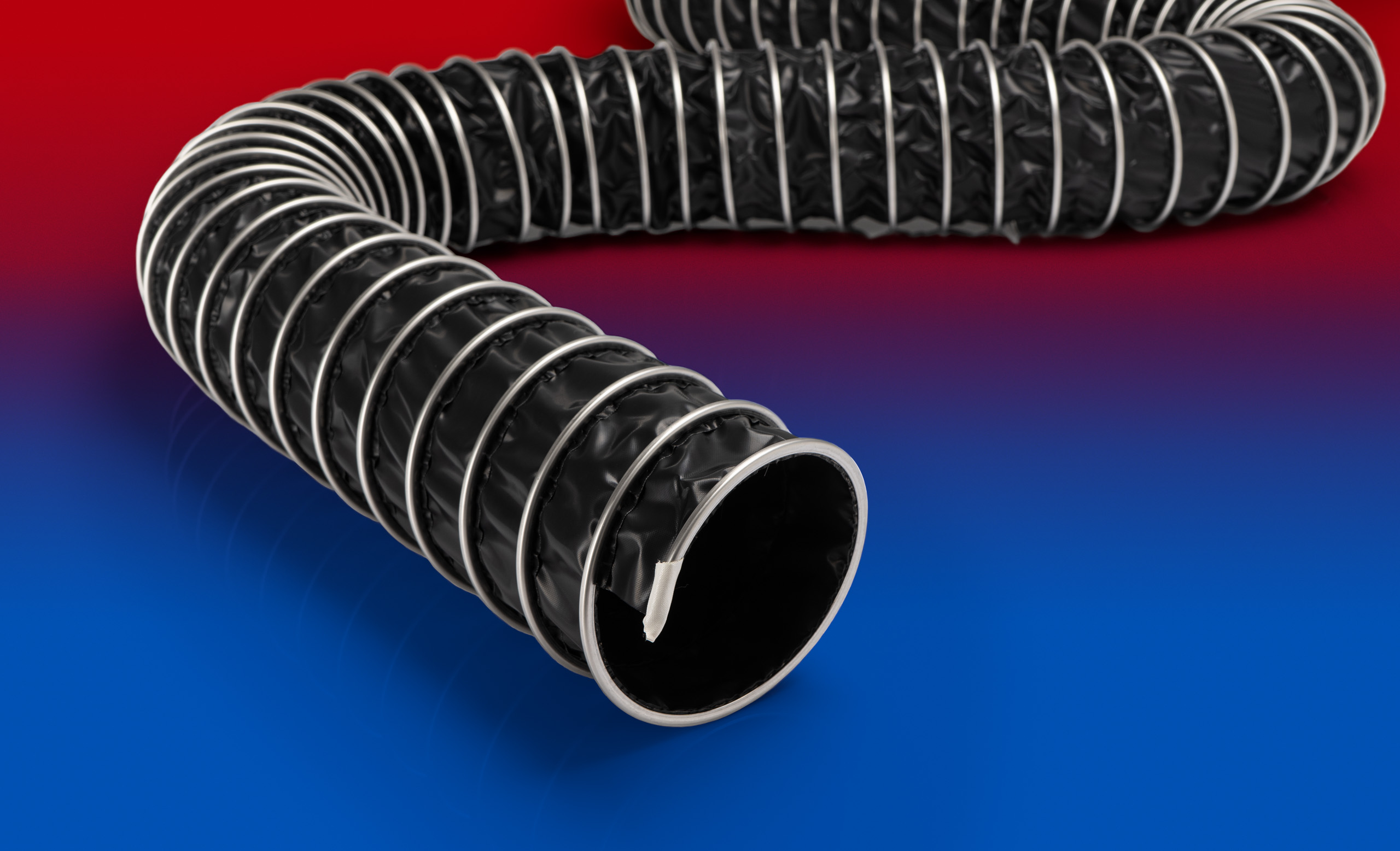 Norres 475-0075-1003-6 Elektrisch leitfähiger Klemmprofilschlauch, hoch chemikalienbeständig (bis +270°C), Innen-Ø 75-76 mm, Aussen-Ø 87 mm, Biegeradius 24 mm - Norres 475 - CP PTFE-INOX 475 EC